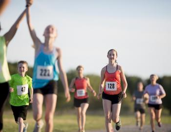 People running towards finish line