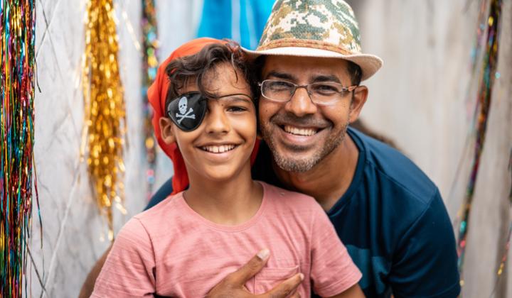 portrait of father and son at pirate festival