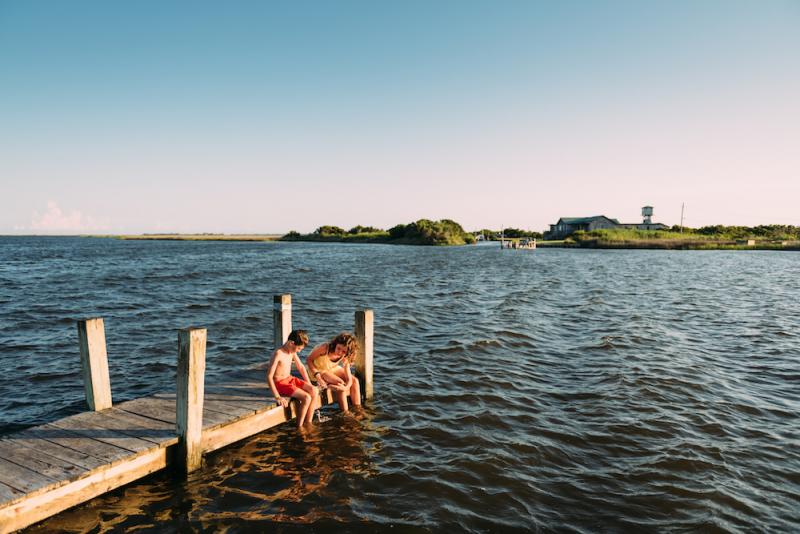 kids on a pier